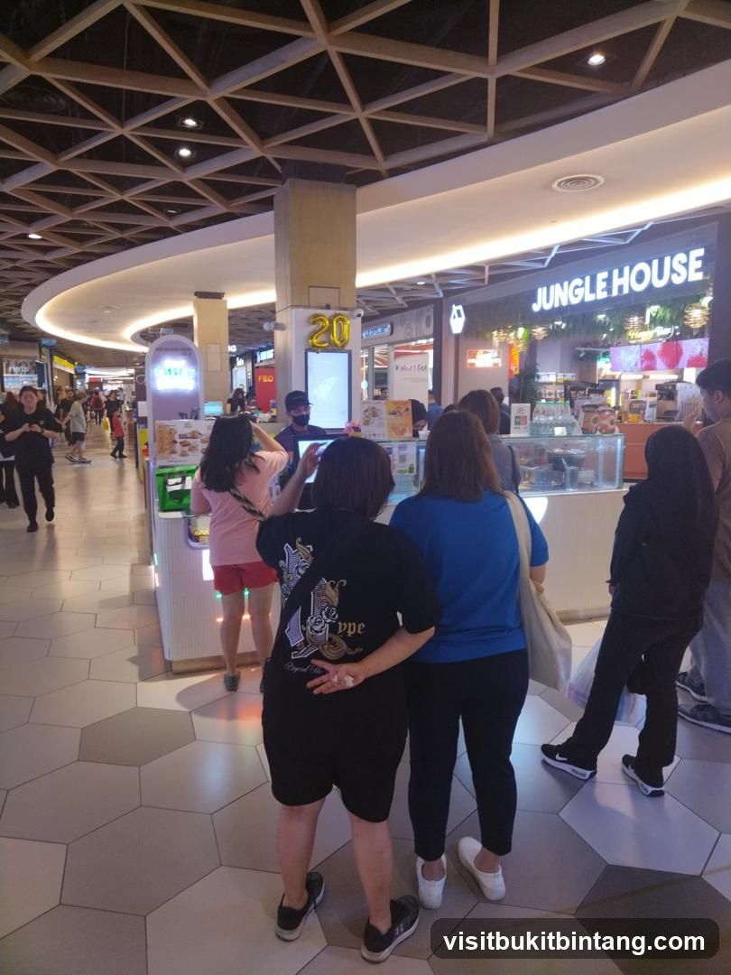 People queuing at a food stall
