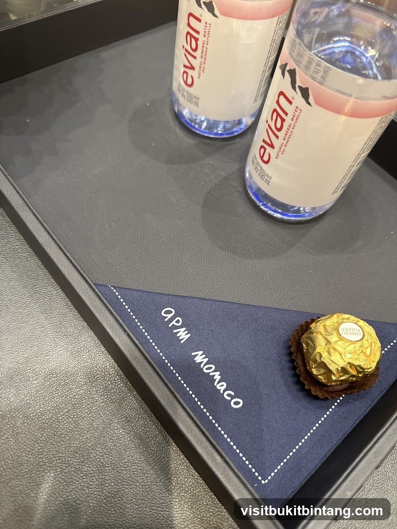 Tray with Evian Water and Chocolate