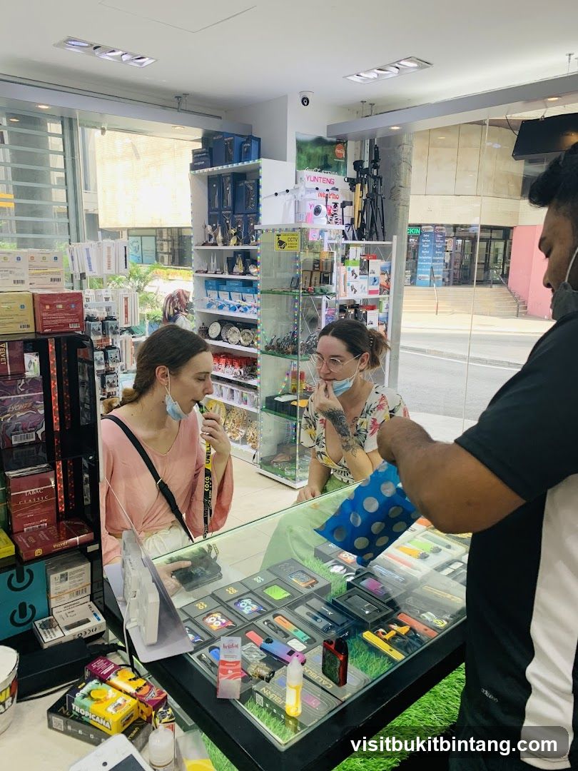Shop interior with customers and staff