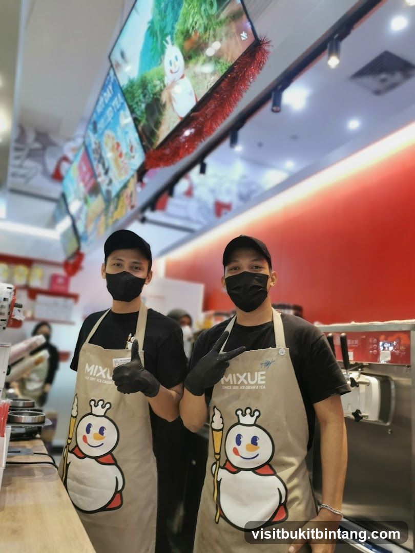 Two employees in aprons