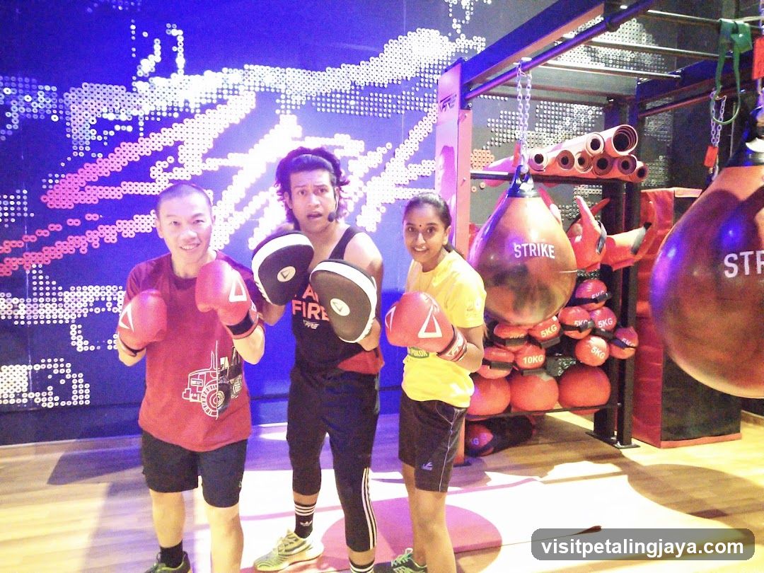 Boxing Gym Interior with Three People