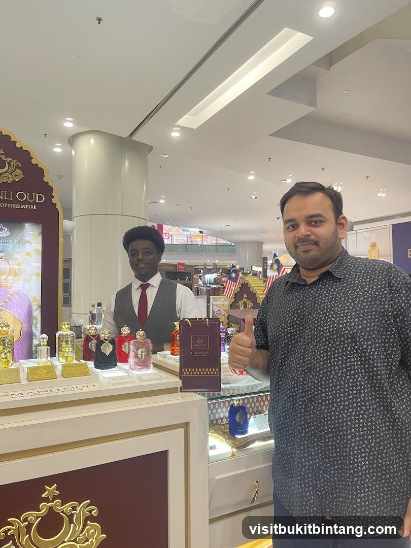 Perfume display with staff and customer