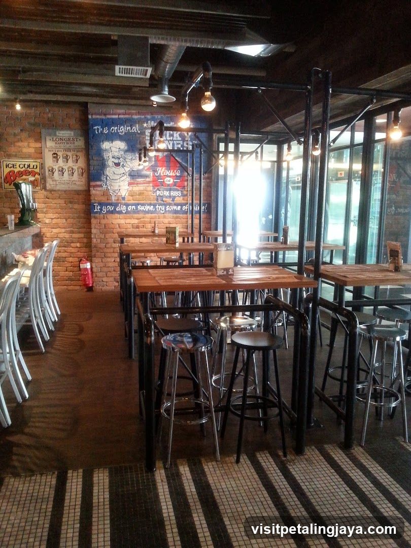 Bar Interior with Brick Wall and Industrial Lighting