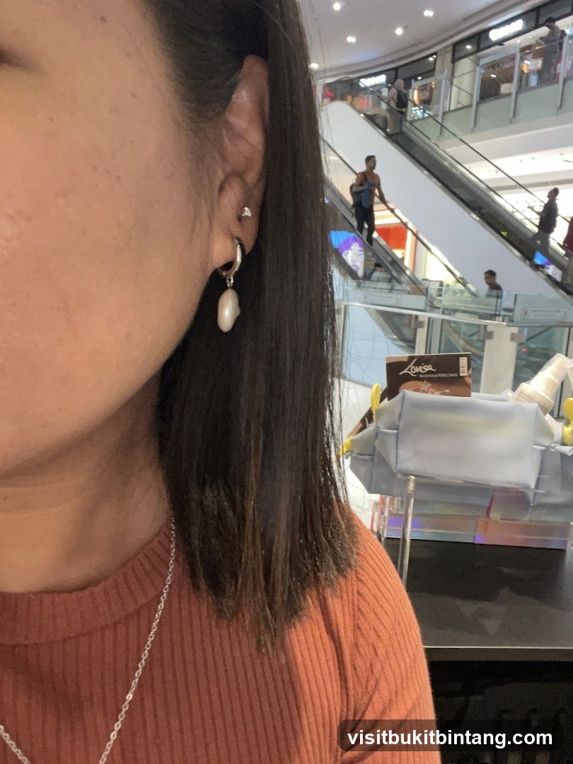 Woman wearing earrings in a mall
