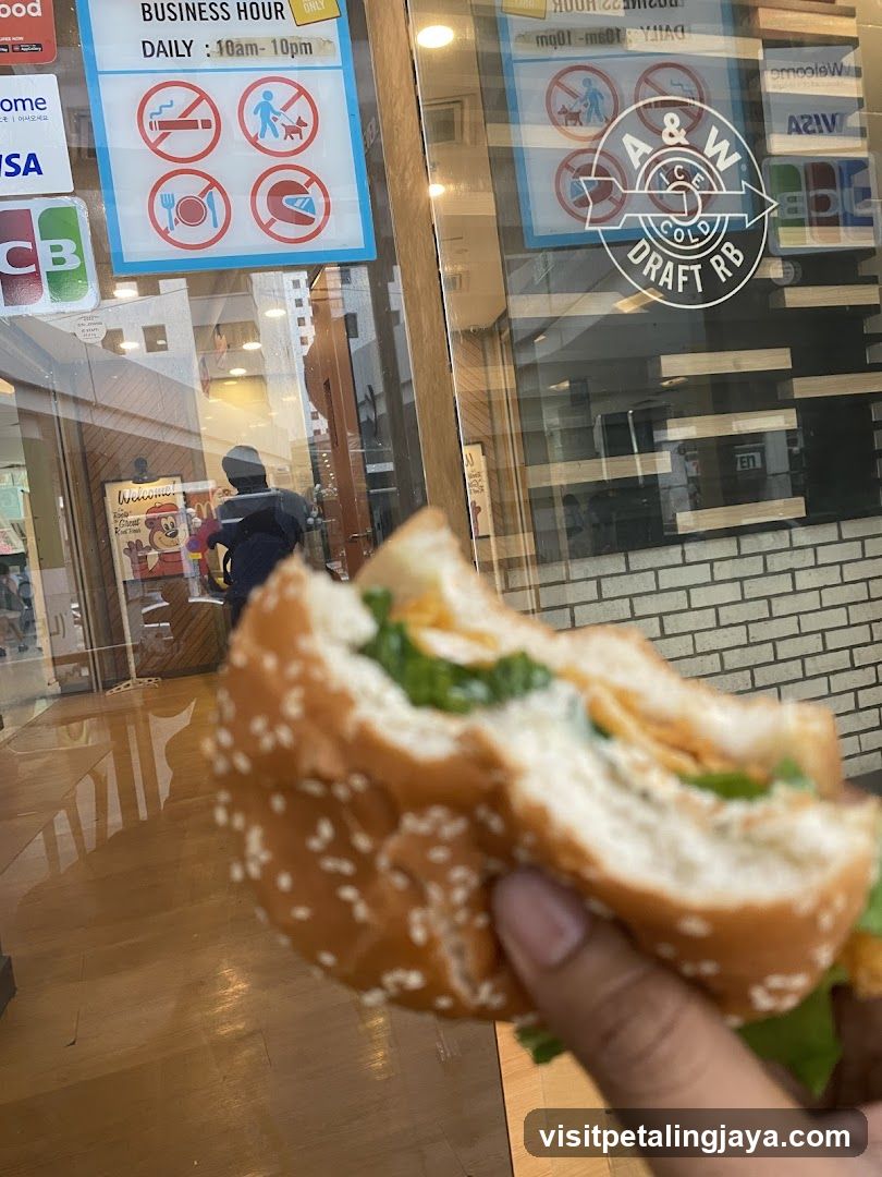 Burger in hand near storefront