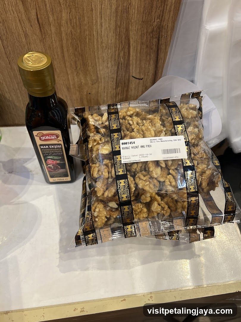 Walnuts and Oil Bottle on Counter