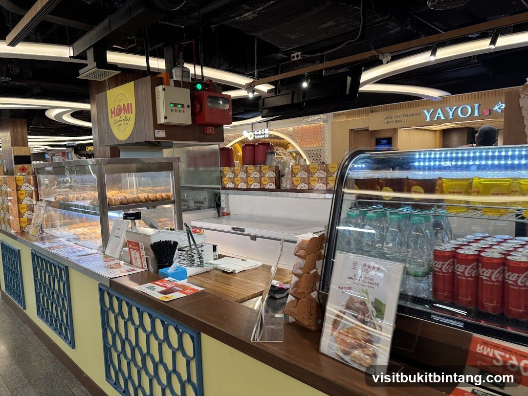 Food stall counter with baked goods and drinks