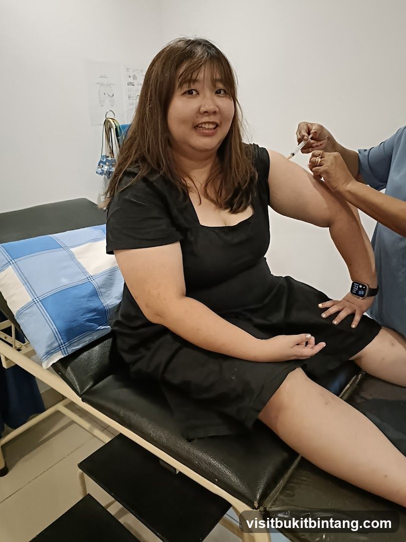 Woman receiving vaccination