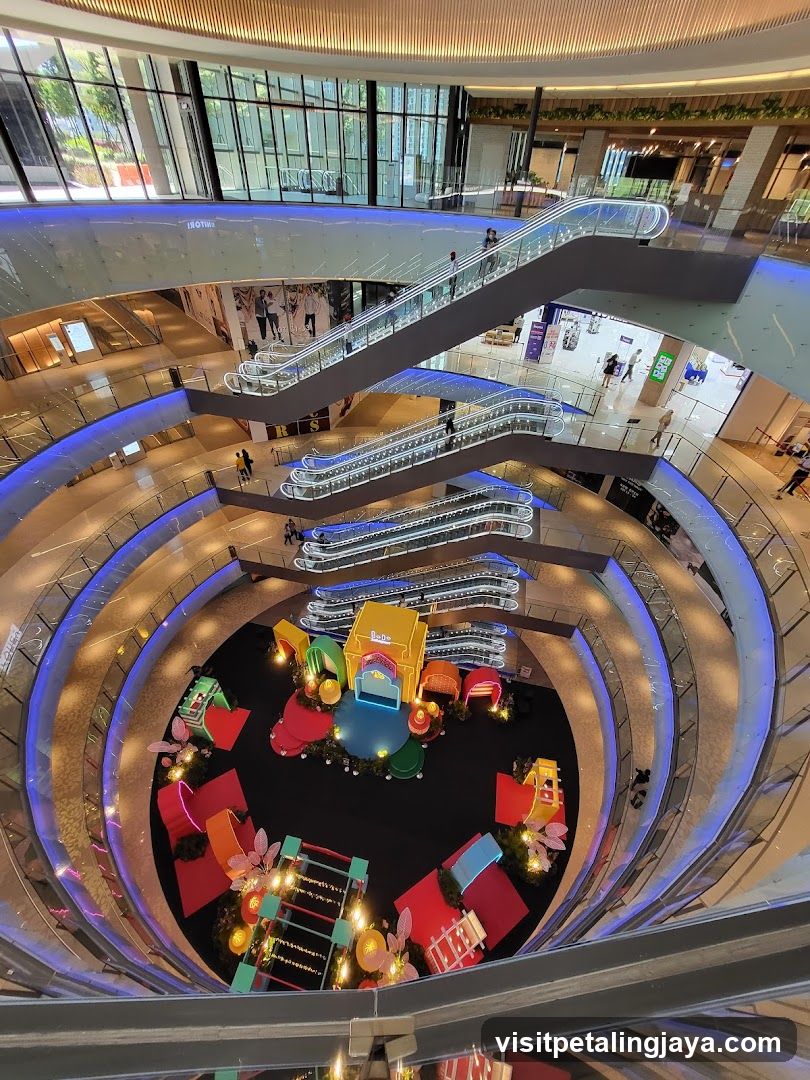 Mall Interior with Spiral Escalators and Play Area
