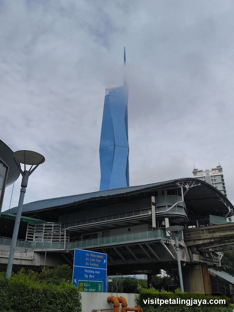 Tall Blue Tower with Overhead Structure
