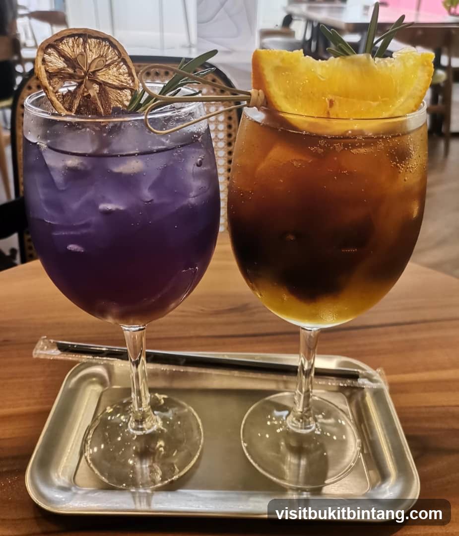Two colorful drinks on a tray