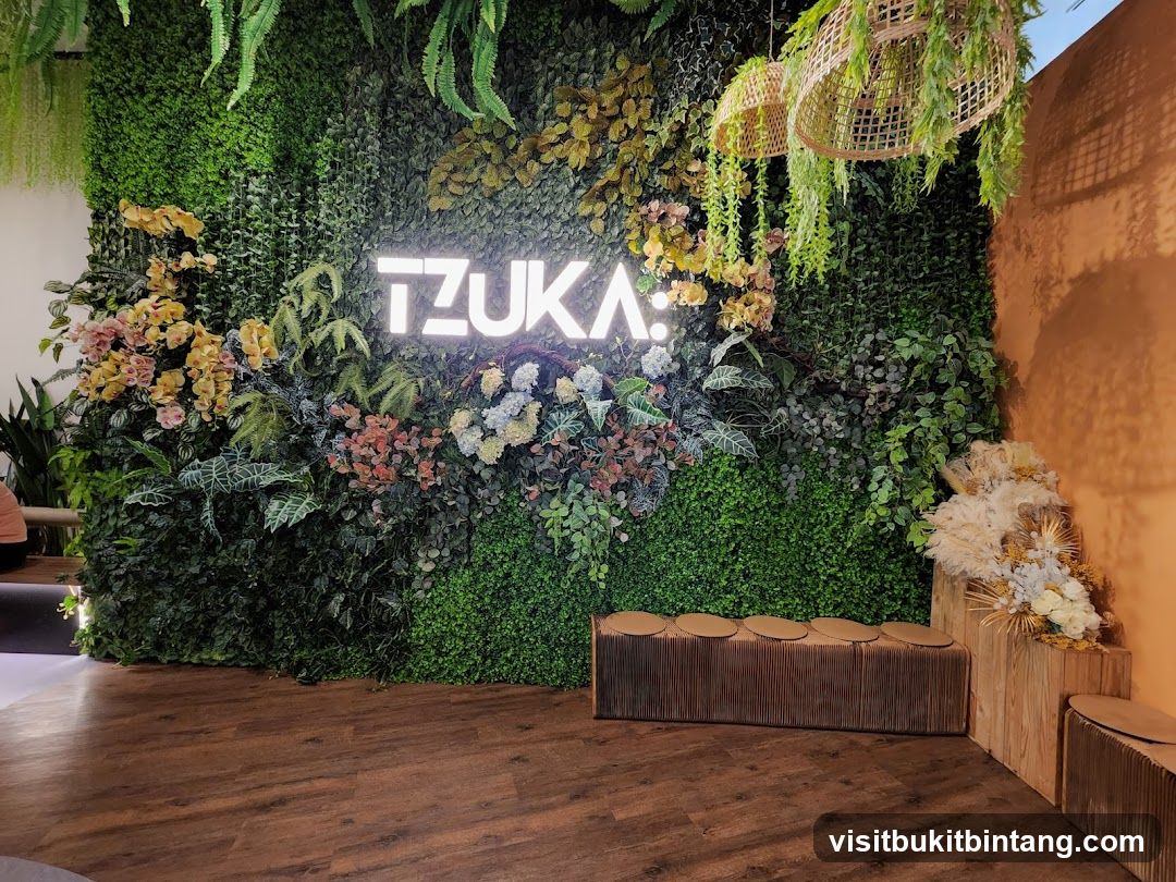 TZUKA Logo on a Green Wall