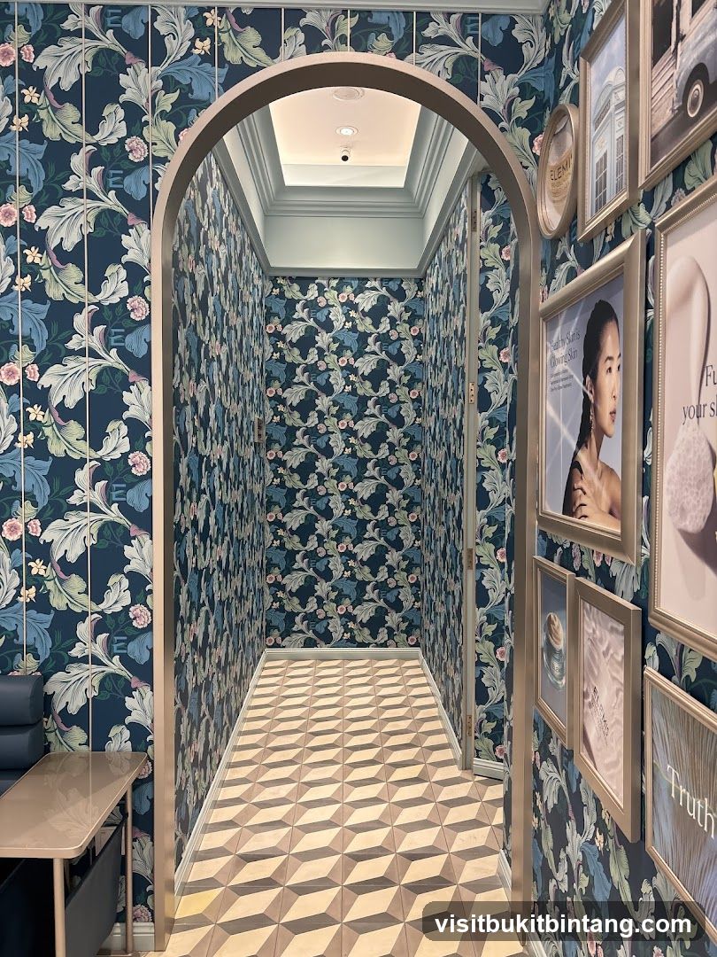 Hallway with Floral Wallpaper and Framed Art