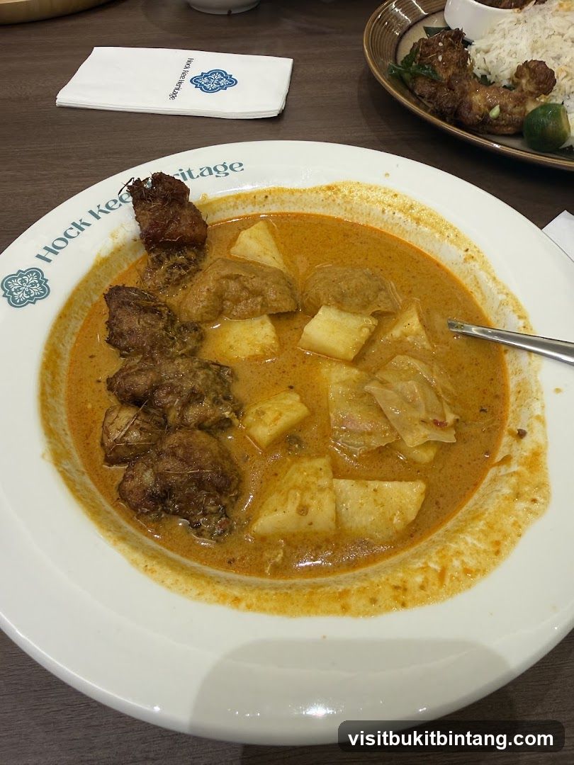 Curry dish with meat and potatoes