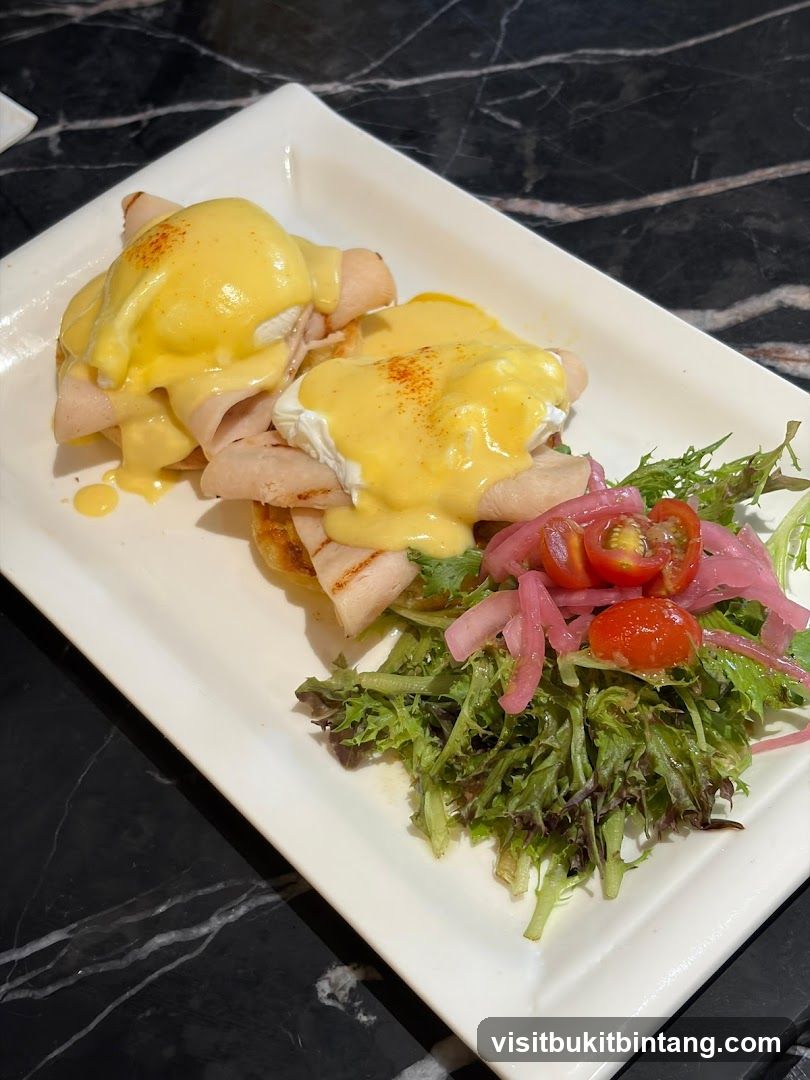Eggs Benedict with Turkey and Salad