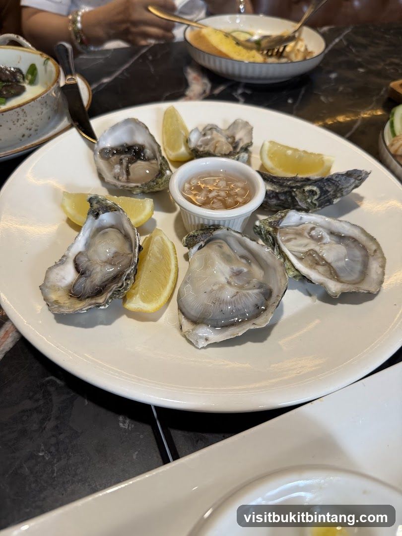 Oysters with Lemon and Dipping Sauce