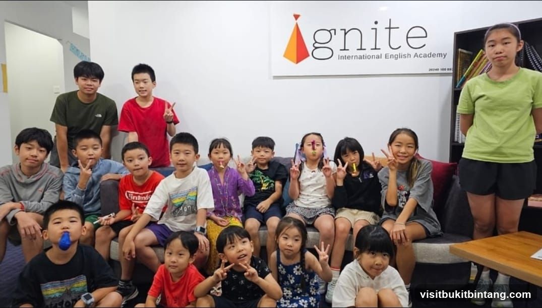 Children posing for a photo at an English academy