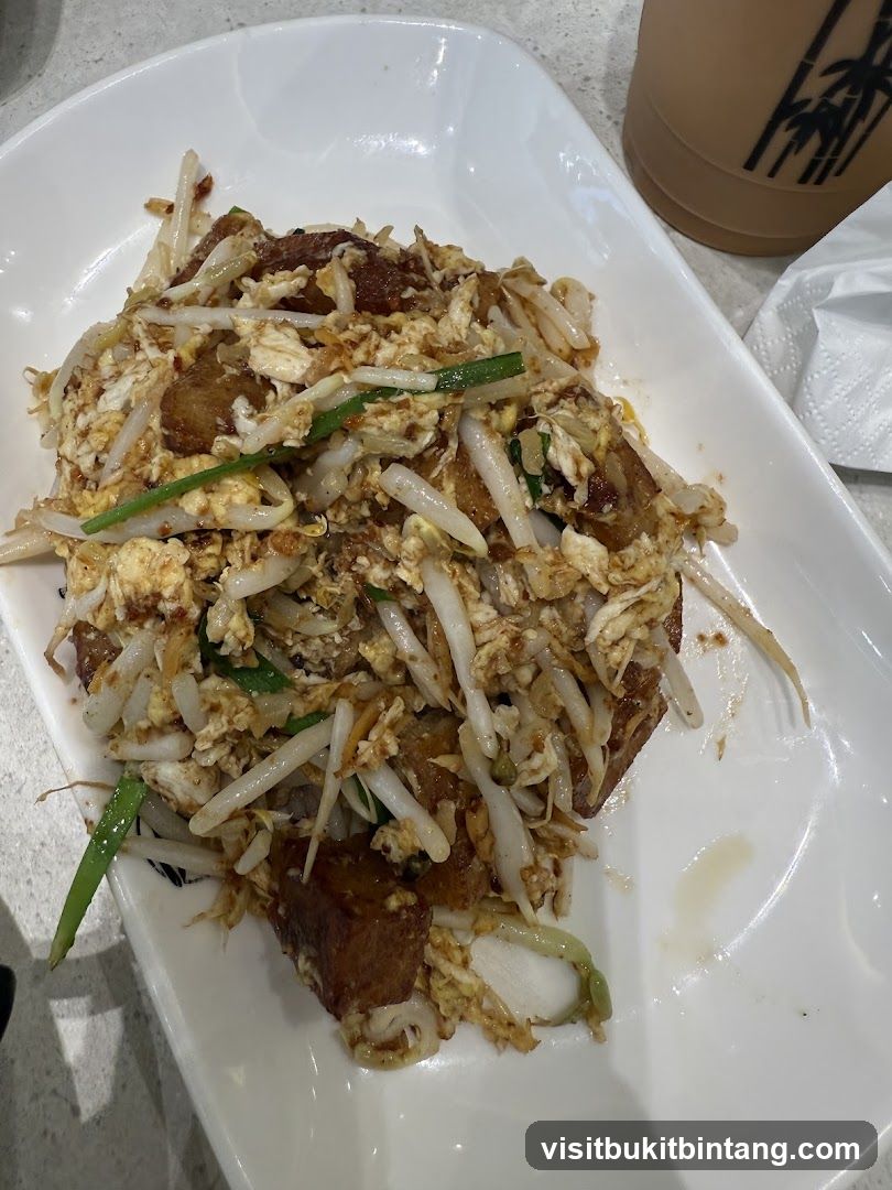 Stir-fried dish with taro cake and bean sprouts