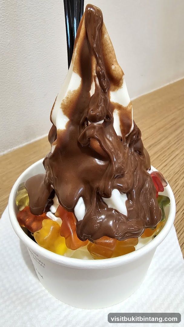 Soft Serve Ice Cream with Chocolate Drizzle and Gummy Bears