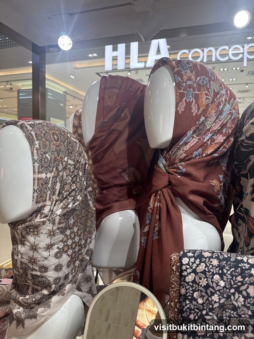 Mannequins wearing patterned scarves