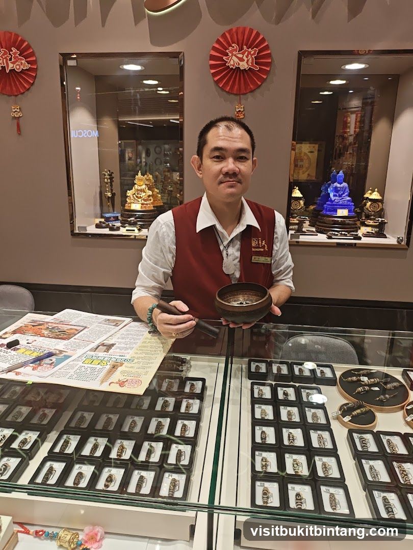 Shopkeeper holding a bowl and stick