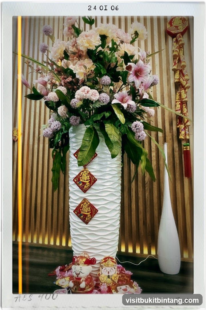 Floral Arrangement with Chinese New Year Decorations