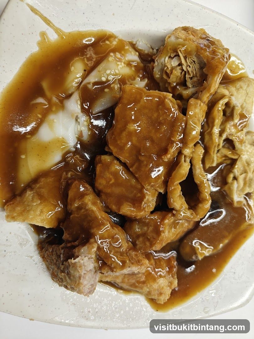 Fried Tofu and Meat Dish with Gravy