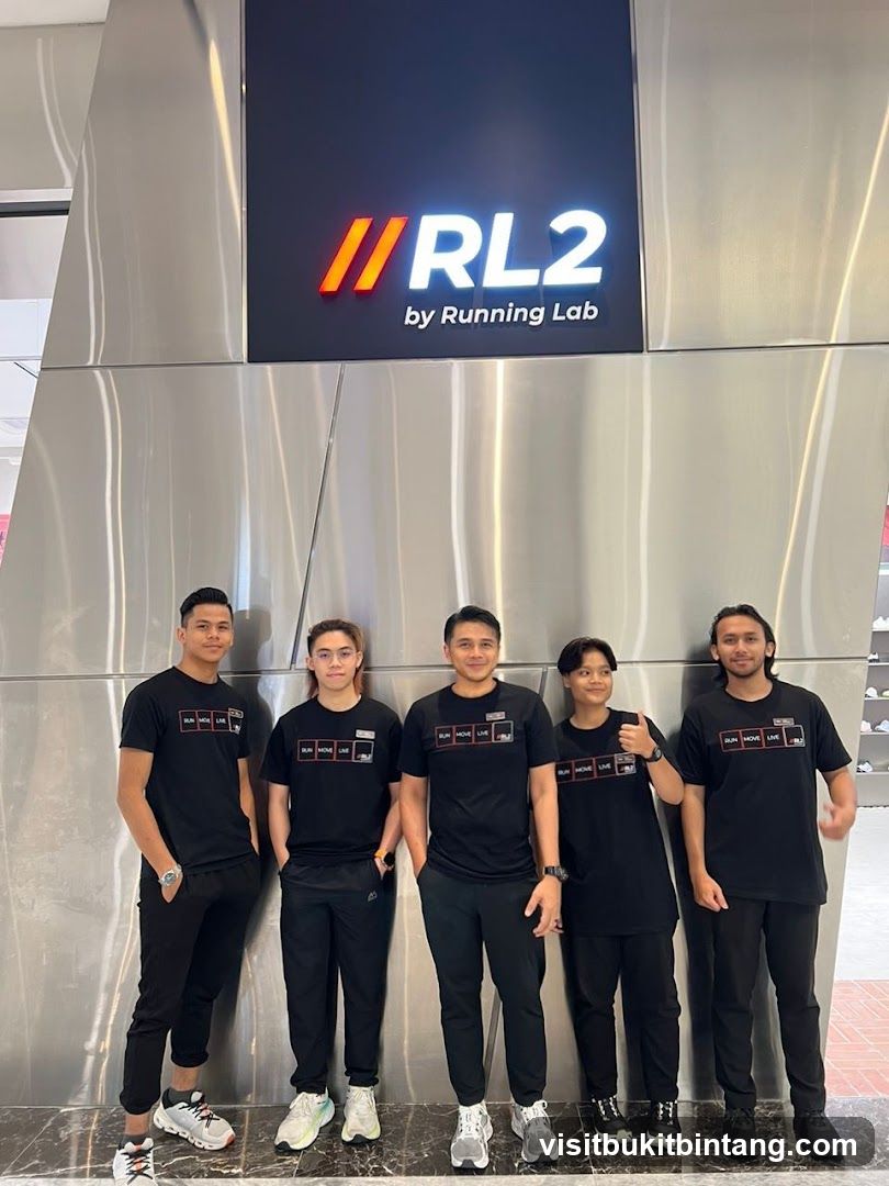 Staff Posing in Front of Store Signage