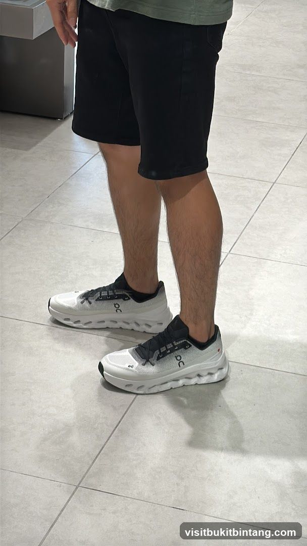 Man wearing white running shoes