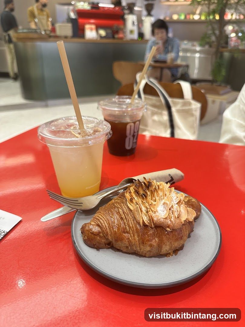 Croissant and Drinks at a Cafe