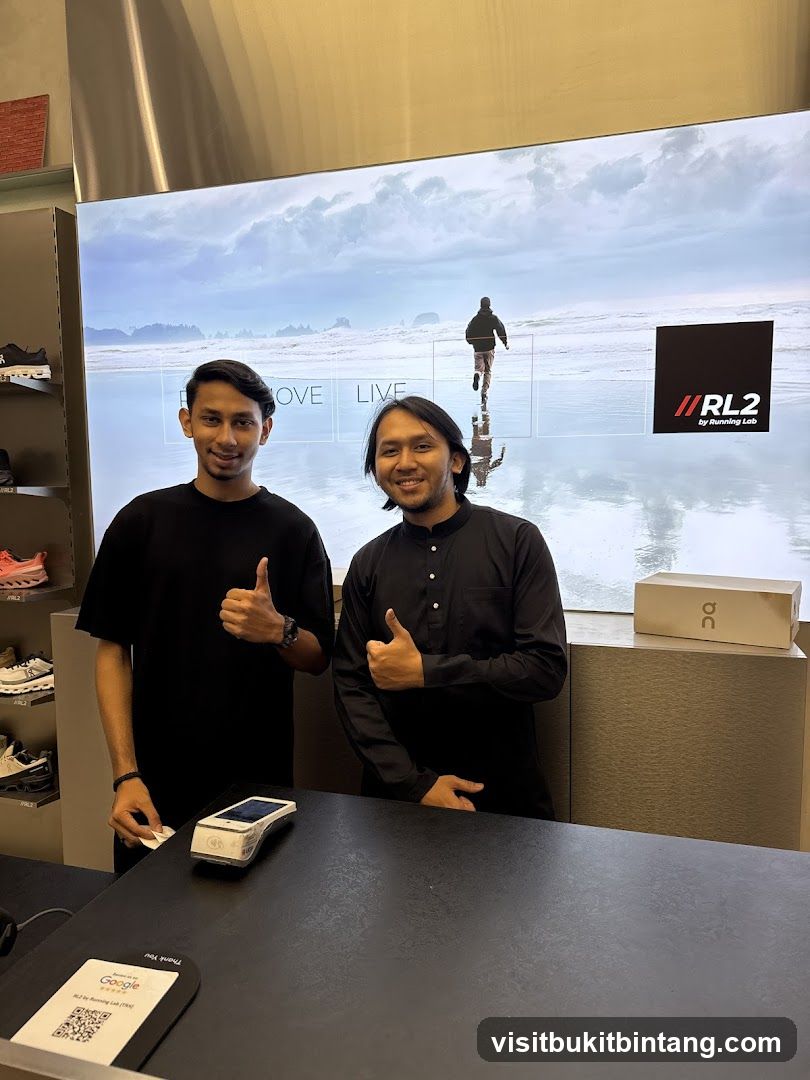 Two men giving thumbs up in a store