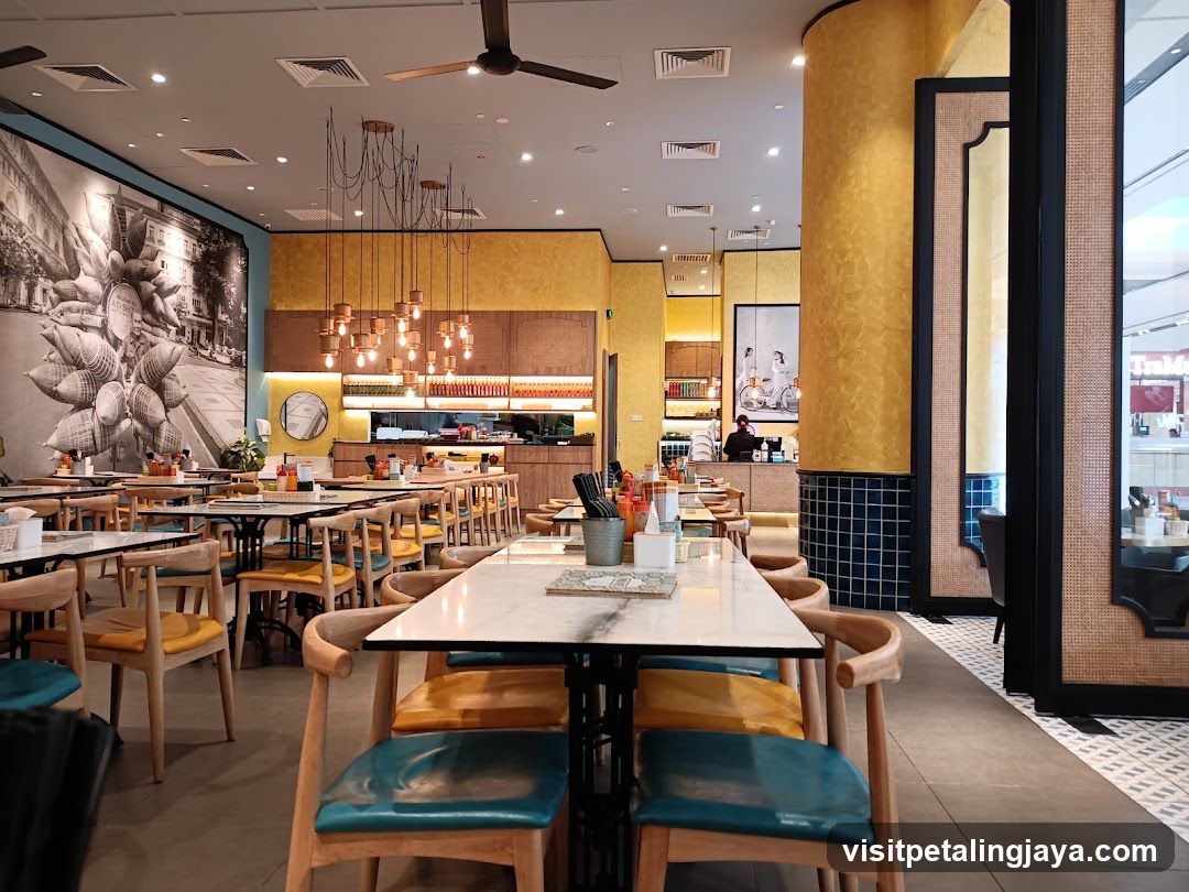 Restaurant Interior with Yellow Walls and Modern Lighting