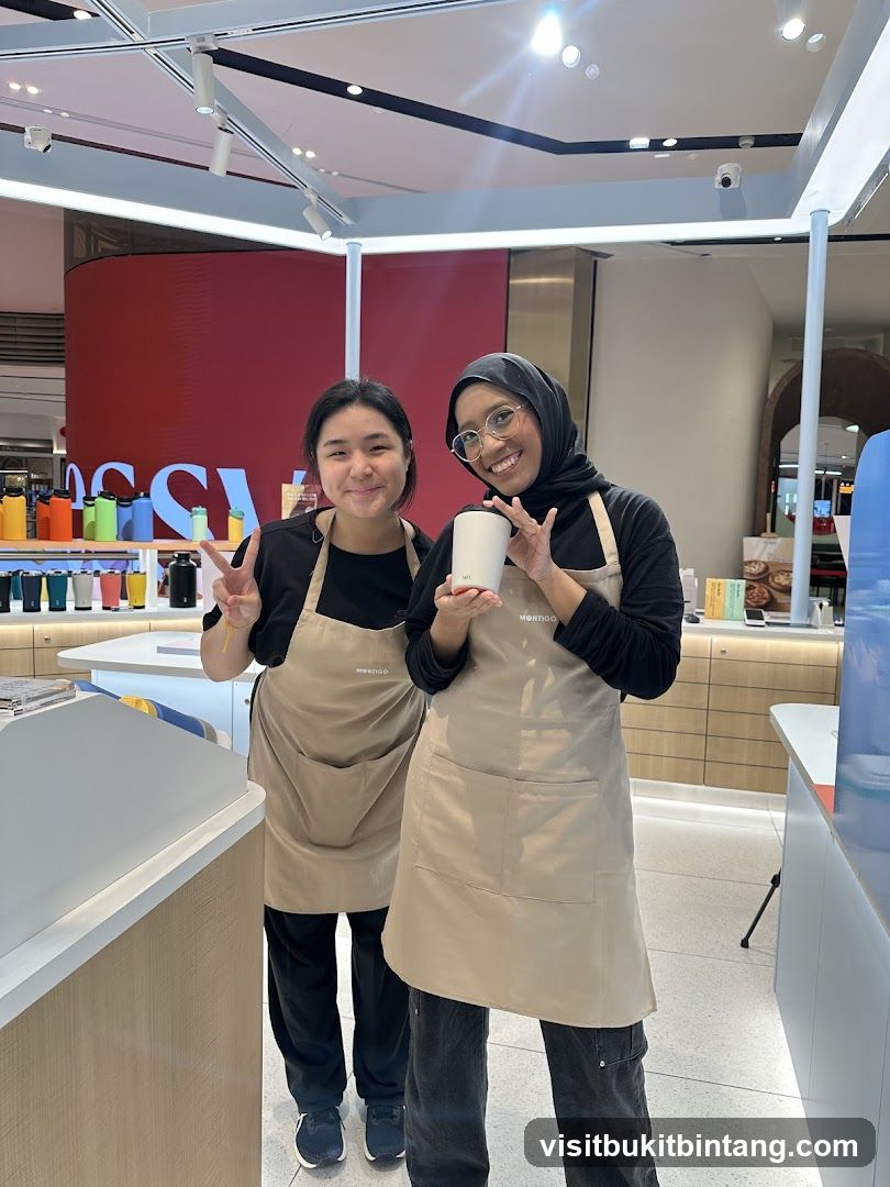 Two employees in aprons