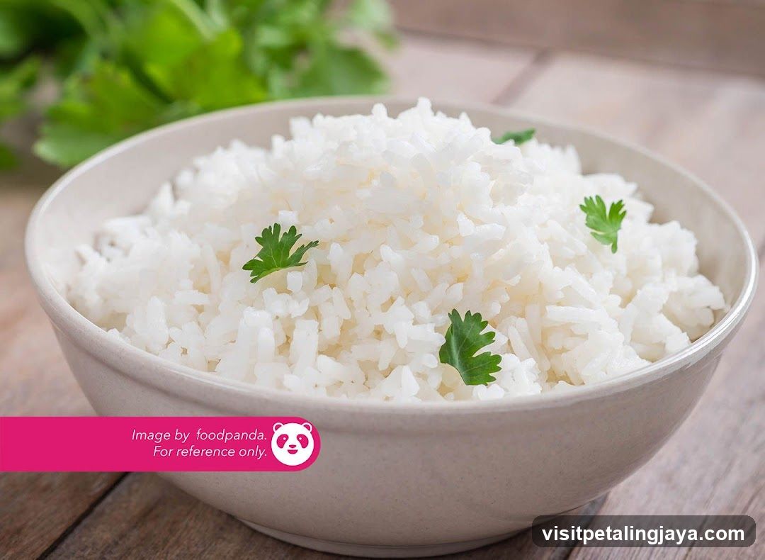 Bowl of White Rice with Parsley Garnish