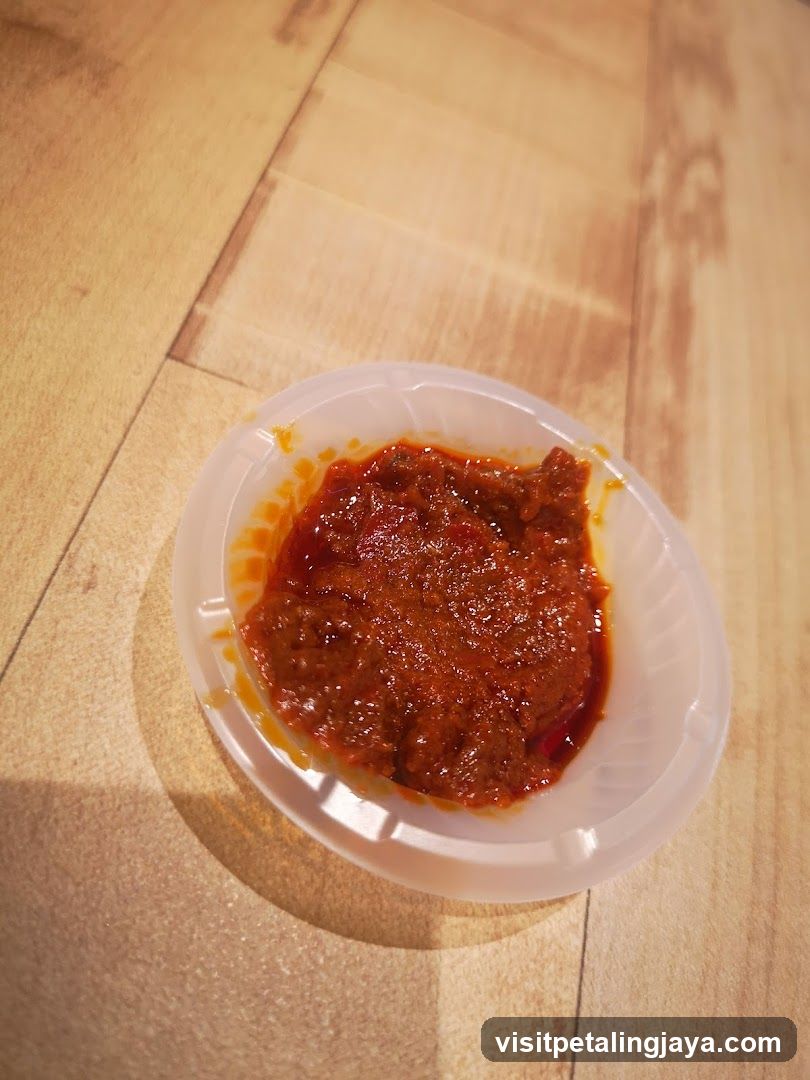 Sauce in plastic container