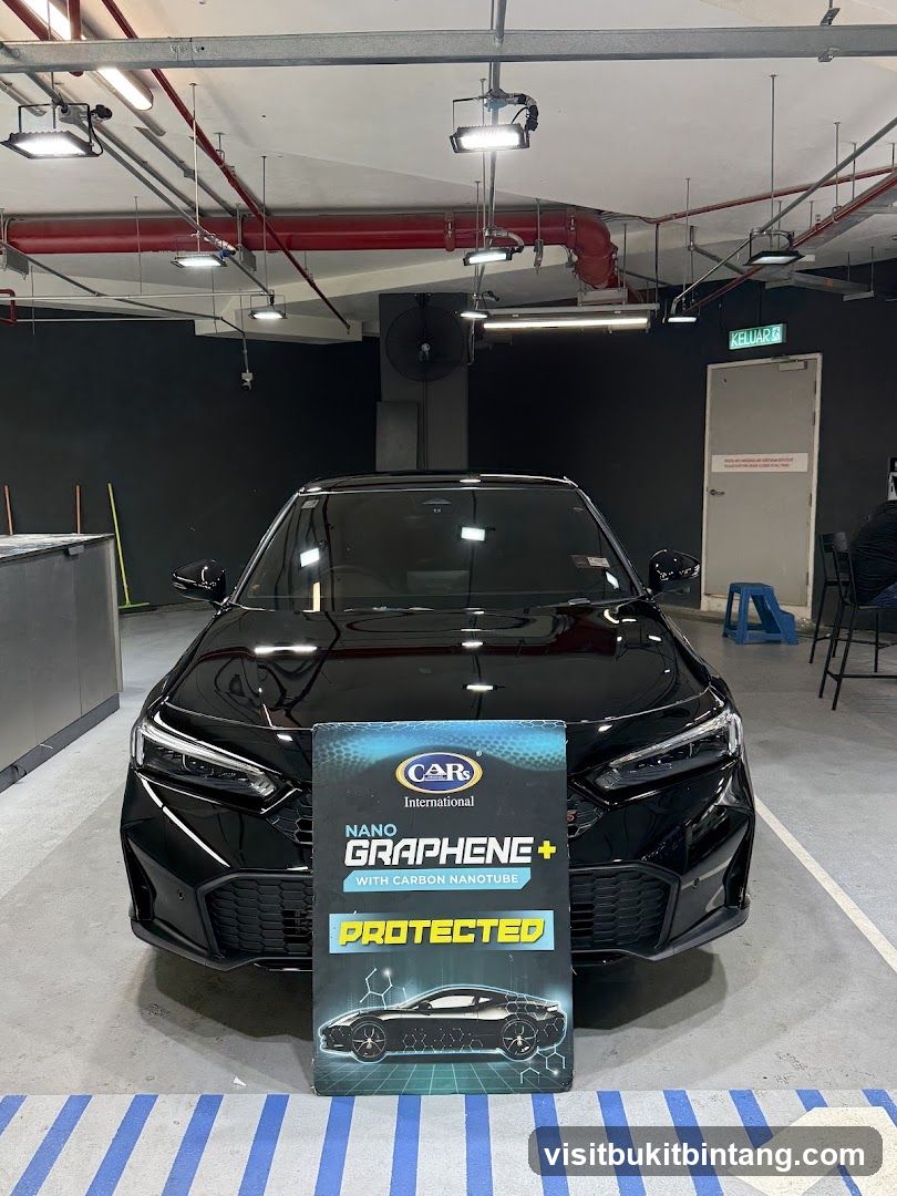 Car with Nano Graphene+ Protected Sign