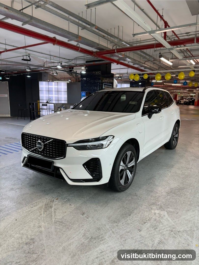 White Volvo XC60 in Parking Garage