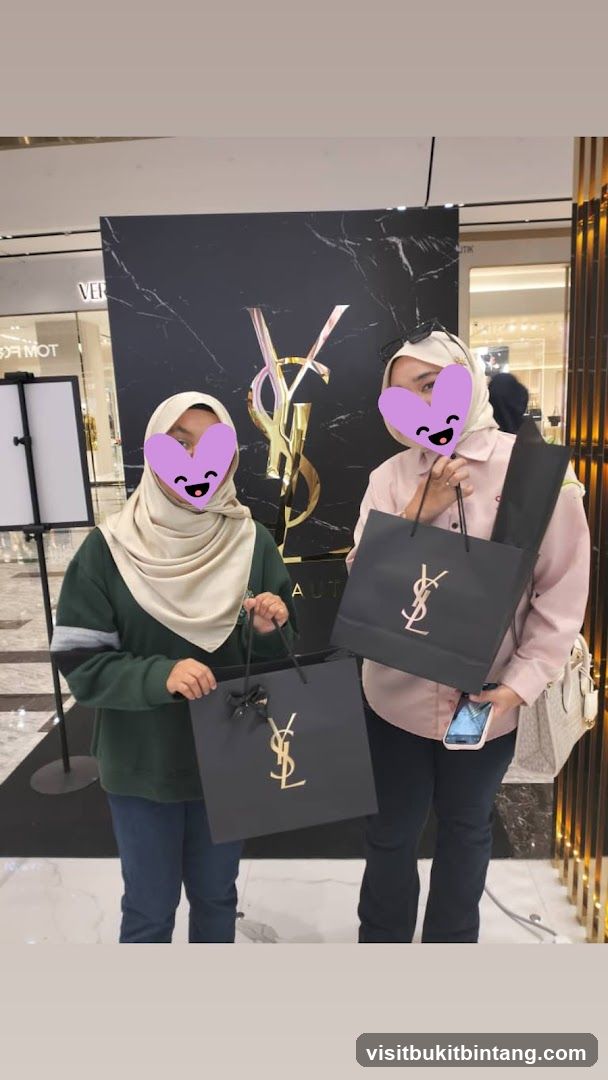 Two people holding shopping bags