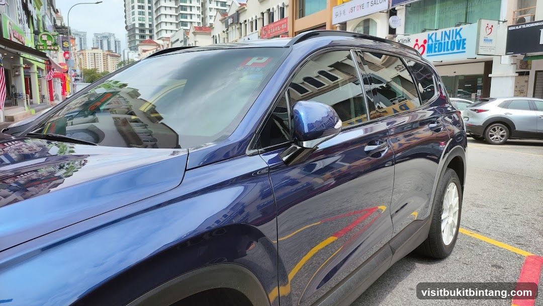 Reflections on a Blue Car