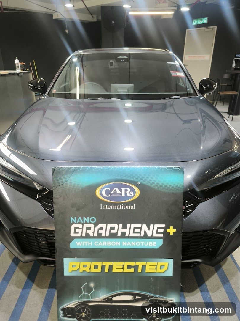 Car with Nano Graphene+ Protected Sign