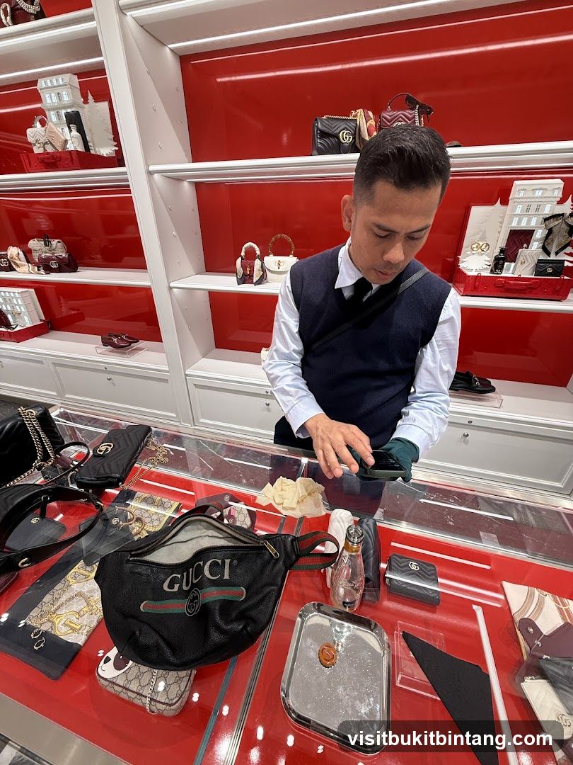 Sales Associate Assisting Customer with Gucci Products