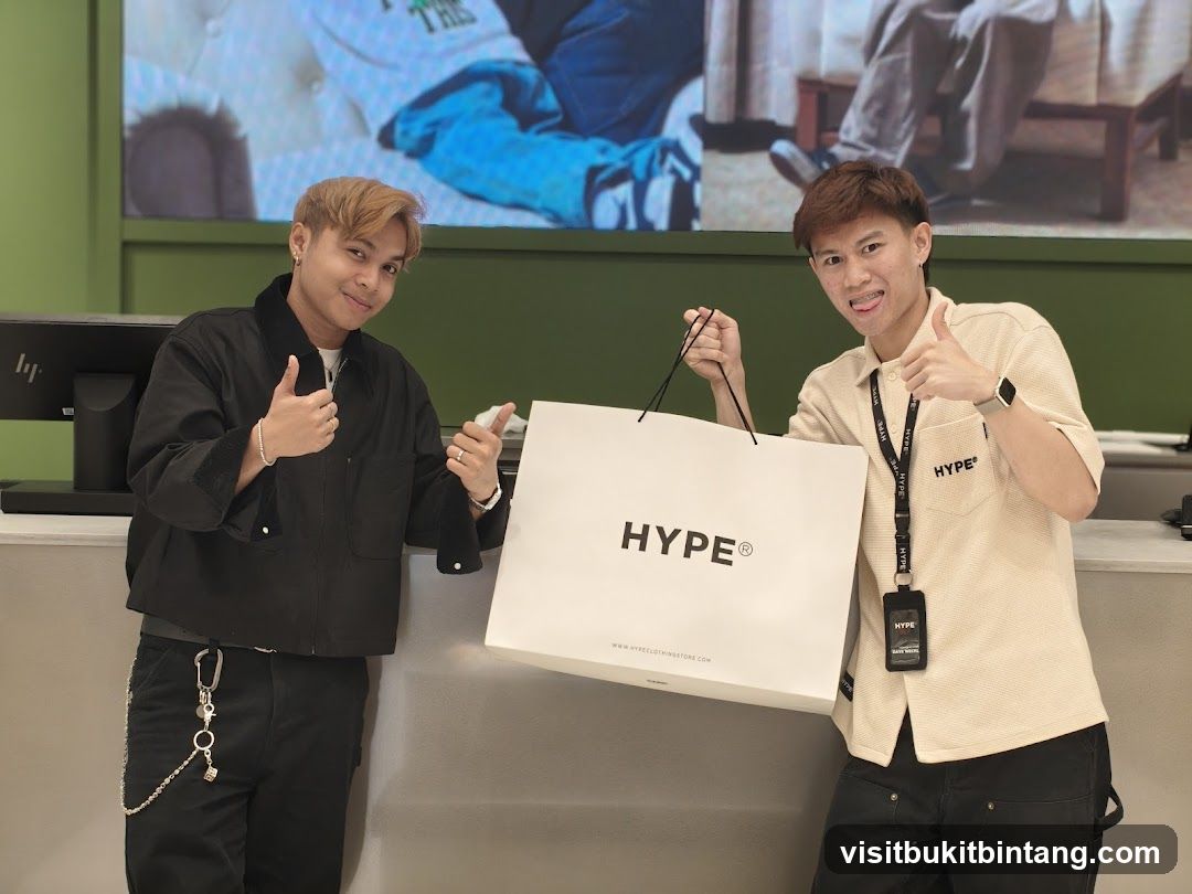 Two men holding a shopping bag