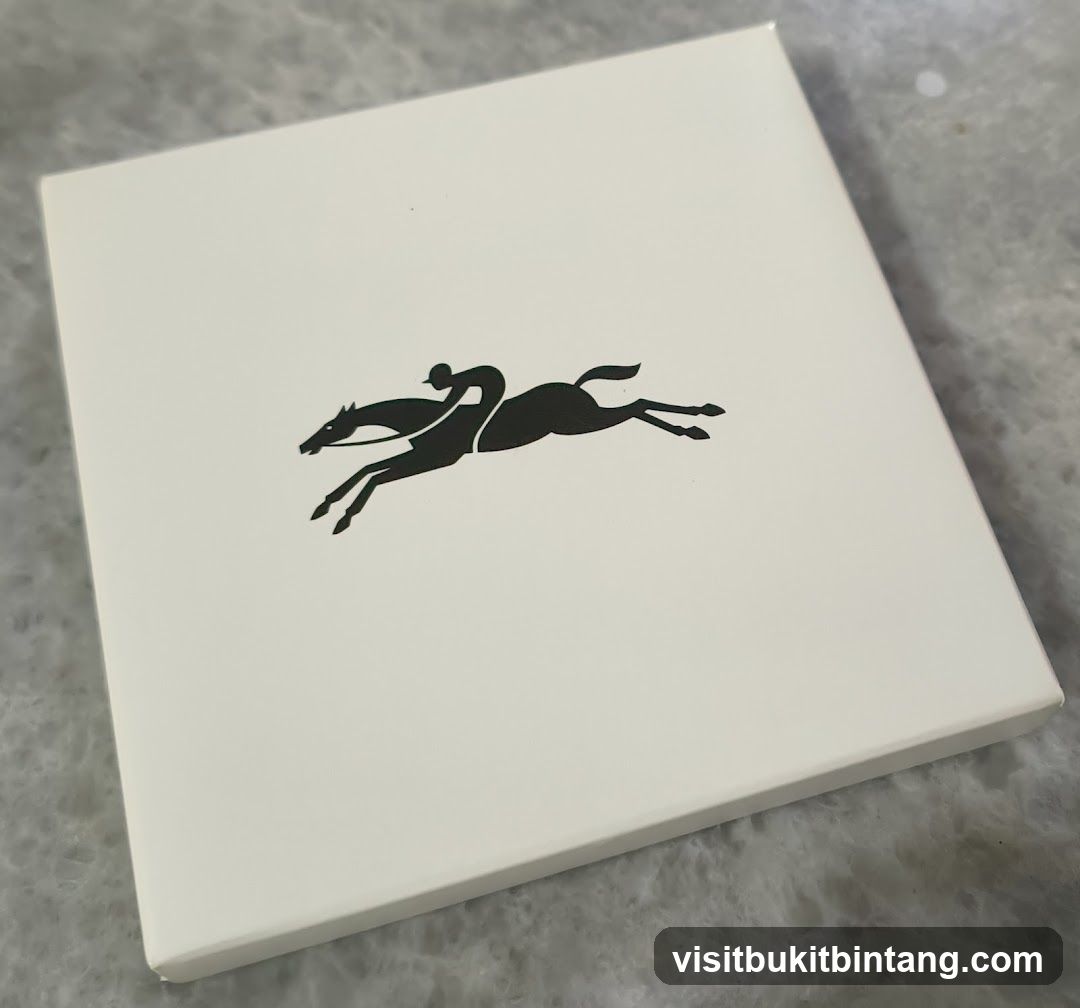 White box with horse and rider logo