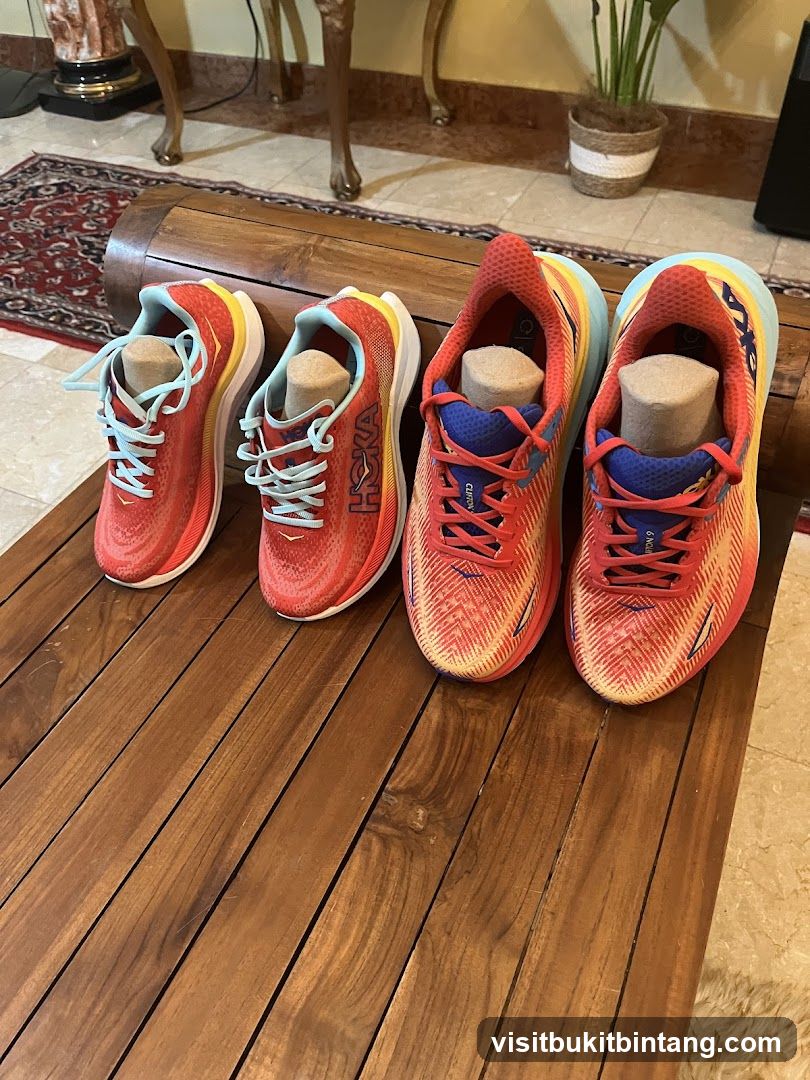 Two pairs of Hoka running shoes