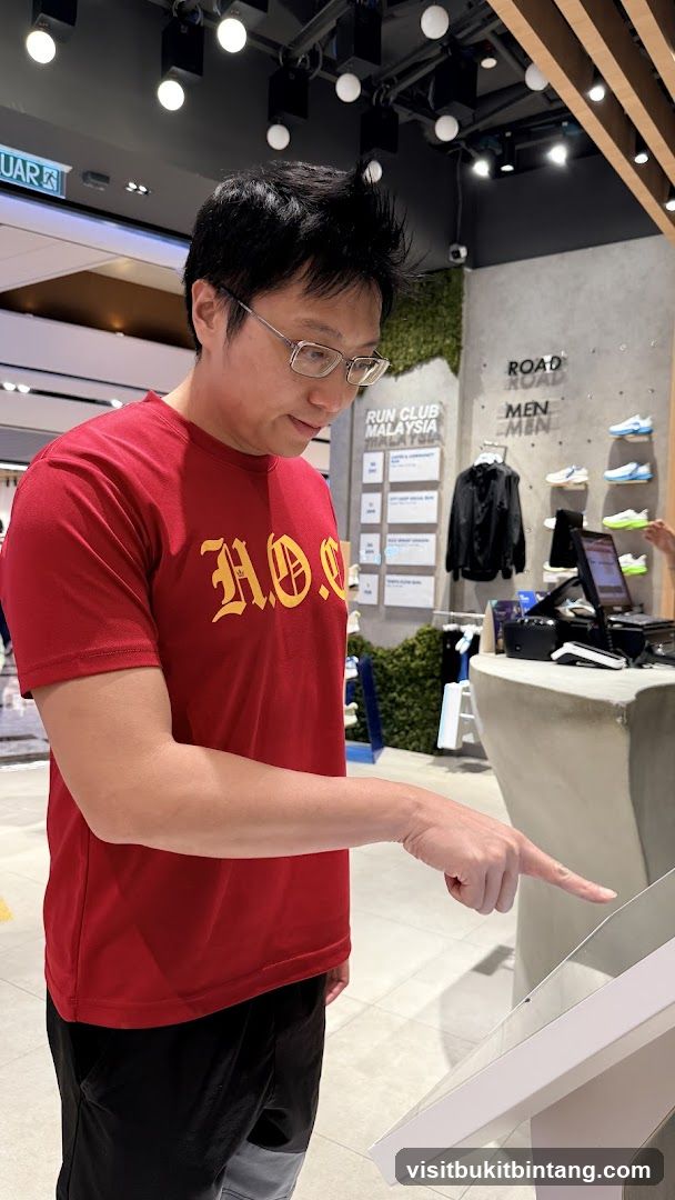 Man Interacting with a Touchscreen Display