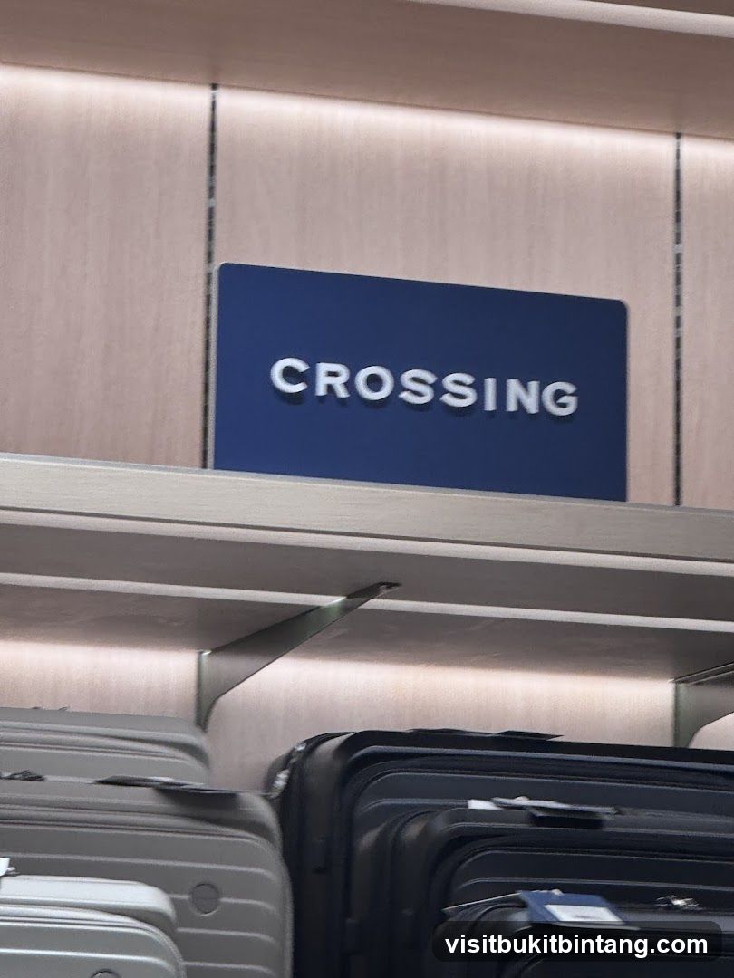 Signage for "CROSSING" above luggage display