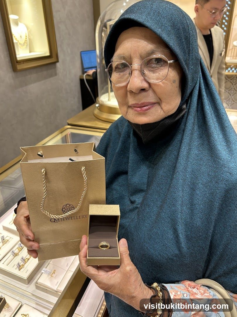 Woman holding a ring and shopping bag