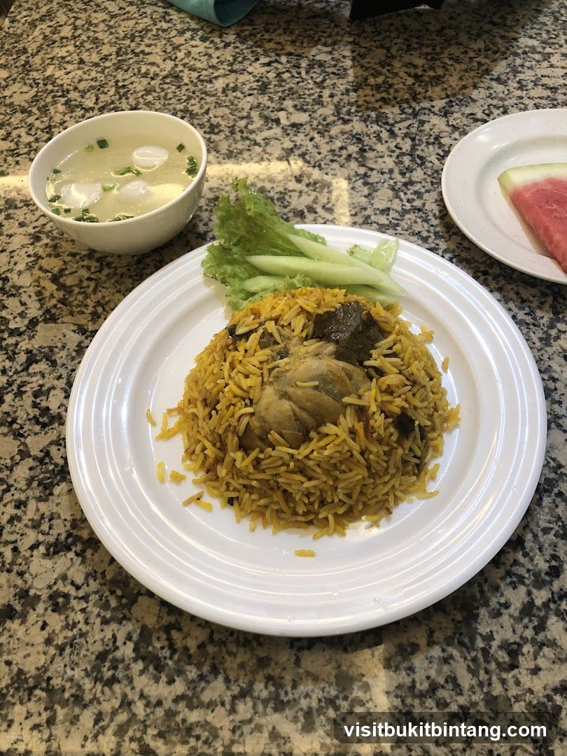 Chicken Biryani with Soup and Watermelon