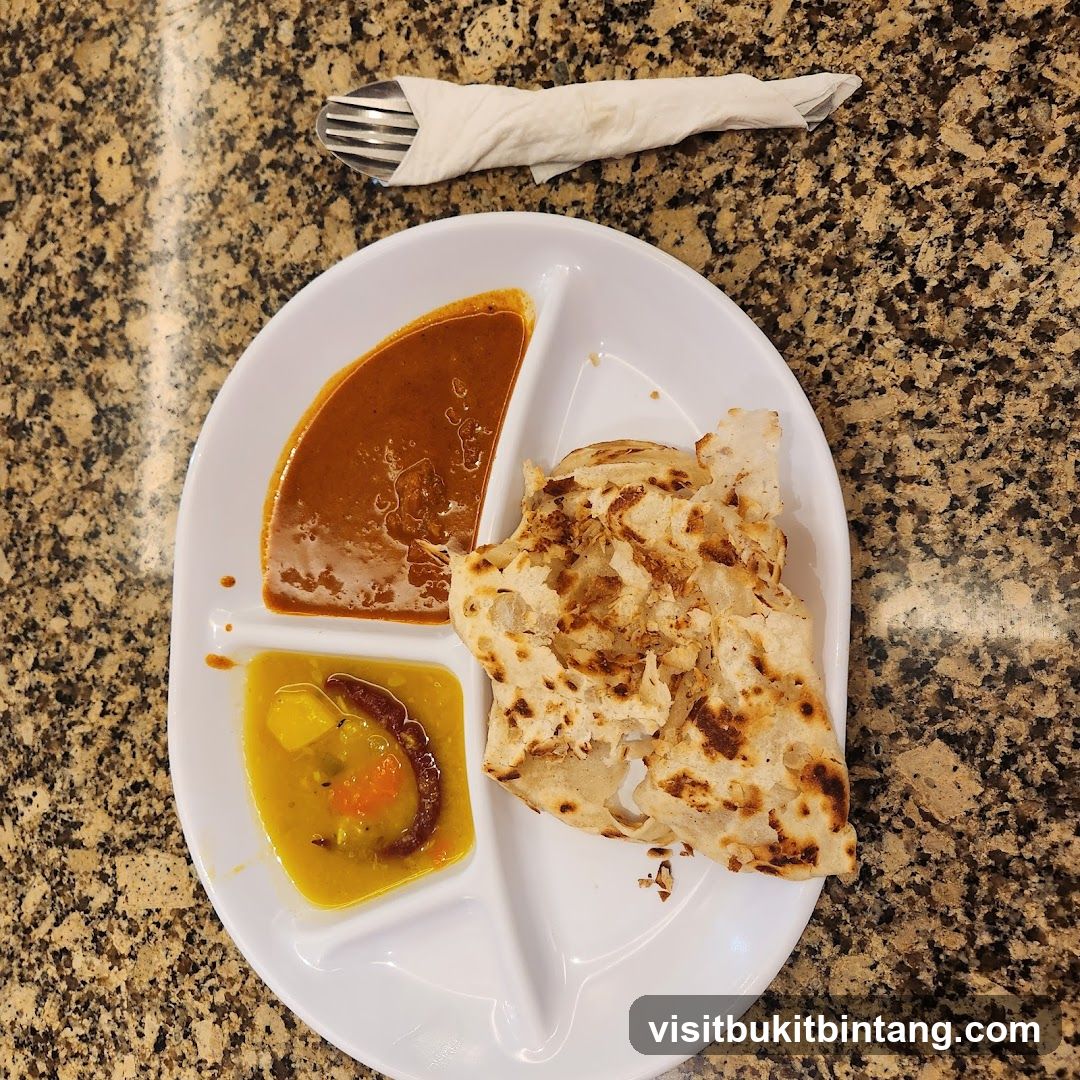 Roti Canai with Curry and Dal