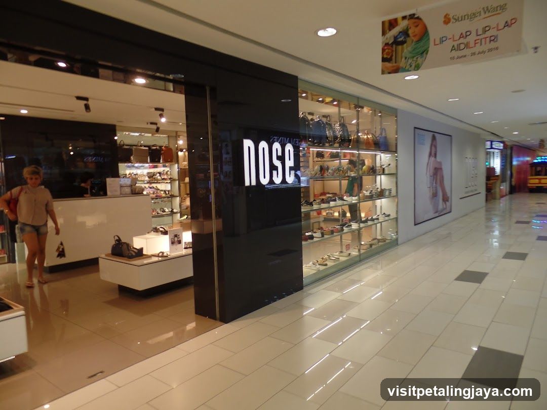Shopping Mall Corridor with Storefronts